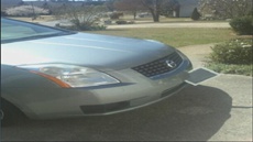 iPad застрял в бампере автомобиля