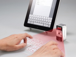 «Магический куб» спроецирует виртуальную клавиатуру на любую поверхность