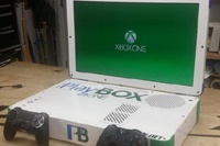 Моддер собрал из PS4 и Xbox One один 22-дюймовый «ноутбук»