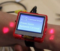 Новая технология превращает руку в сенсорную панель