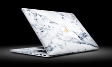 Представлен мраморный MacBook Pro с золотым логотипом Apple