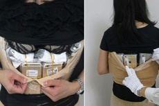 Китаянка попыталась провезти под одеждой сотню iPhone