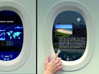 Французская компания превратила иллюминатор самолета в сенсорный планшет