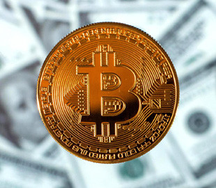 Стоимость биткоина превысила рекордные $60 тыс.