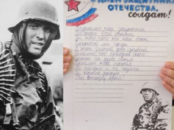 Російські школярі підписували солдатам на фронт листівки із фотографією есесівця