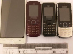 В Николаевский СИЗО заключенному по почте прислали четыре мобильных телефона