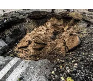 "Ми все відбудуємо": у Дніпрі всього за ніч відремонтували понівечену російською ракетою вулицю. Фото