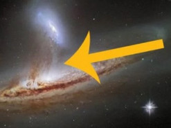 Удивительное зрелище. Телескоп Хаббл запечатлел, как объединяются две галактики