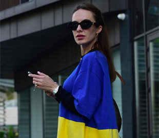 Жити не перестану: дружина Остапчука відповіла на критику через безтурботні фото у красивому одязі