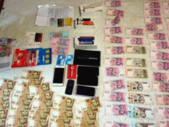 Правоохранители задержали группу аферистов, которые сняли со счетов своих жертв миллион гривен