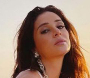 Злата Огнєвіч прокоментувала фотосесії на тлі російської техніки