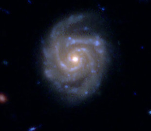 Искусственный интеллект научился находить далекие галактики на нечетких снимках