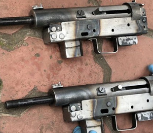 Харьковчанина подозревают в продаже оружия через интернет