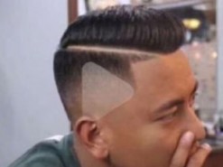 Невнимательный парикмахер сделал китайцу причёску со значком Play