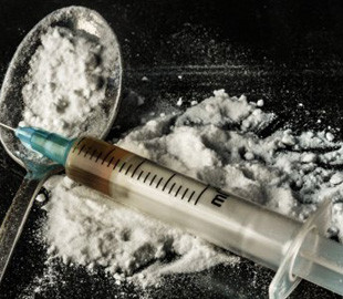 В Киеве у группировки наркоторговцев изъяли запрещенные товары, оружие, валюту и автомобили на сумму 35 миллионов гривен