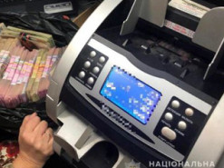 Проводили незаконные операции с криптовалютой. Полиция разоблачила в Киеве сеть обменных пунктов