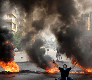 Протести у Лівані продовжуються: Як WhatsApp розділив країну на два табори