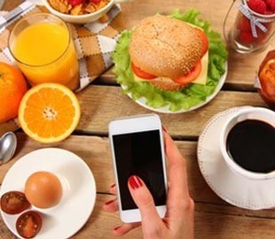 Нью-Йоркский ресторан предлагает прятать мобильные телефоны во время трапезы