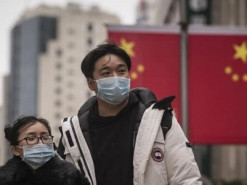 Побоюючись Covid, робітники тікають з китайського заводу iPhone Foxconn