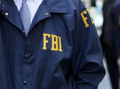 ФБР попросило в Apple зашифровані дані з двох iPhone стрільця з Флориди