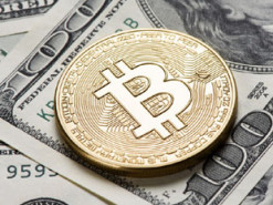 Чи варто купувати автомобілі Tesla за криптовалюту Bitcoin