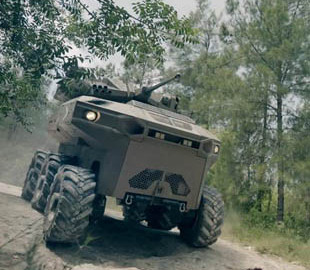 В Израиле представили боевого робота с беспилотниками и ракетами Spike на борту