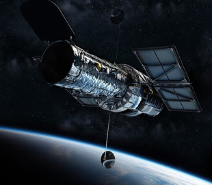 Телескоп Hubble запечатлел последствия межгалактического столкновения