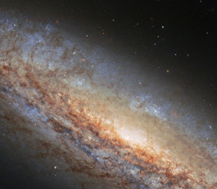 Суперветер и новые звезды. Хаббл сделал снимок далекой галактики с удивительными процессами