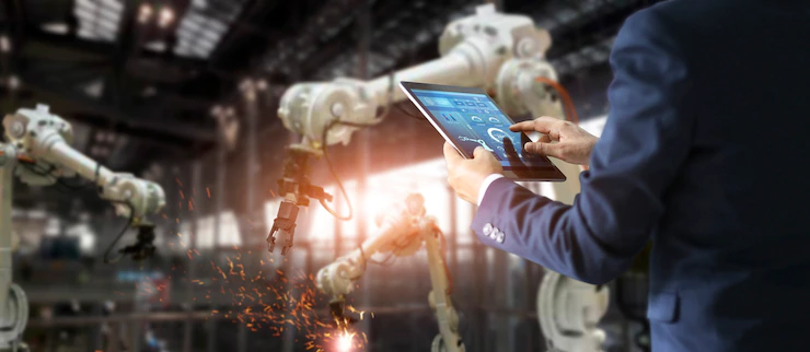 manager-industrial-engineer-using-tablet-check-control-automation-robot-arms-machine_34200-348.webp (36 KB)